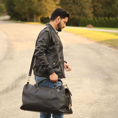Duffy's black leather unisex travel duffel bag